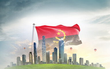 Angola national flag wavering with modern building skyline. Country showing stronger and...