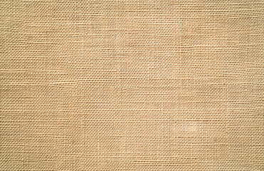 Beige linen background featuring a natural woven texture, perfect for use in decorative projects and design layouts. The burlap-style fabric adds a soft, rustic visual appeal