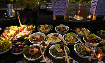 Experience Javanese culinary delights! A spread of flavorful traditional meals at a buffet