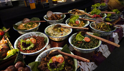 Savor authentic Javanese dishes! An array of delicious traditional food at a local buffet