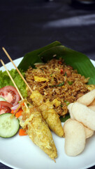 Classic Nasi Goreng: Aromatic classic Javanese fried rice served with beautiful egg rolls. Great for showcasing Indonesian heritage food, dinner, and quick meals