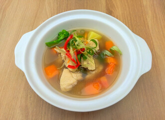 Hearty chicken soup with fresh, colorful vegetables. Perfect for healthy eating, comfort food, or...