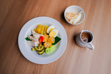 Fresh Gado-Gado: A tempting mix of crisp veggies, protein, and delectable peanut dressing. Great for food photography, wellness, or Asian recipes