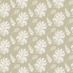 Classic baroque seamless pattern with elegant white feather-like leaves on a beige background. A sophisticated and ornate design for traditional textiles and decor.