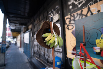 Banana hanging on the street