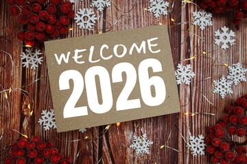 Happy New Year 2026 text on paper craft with LED and