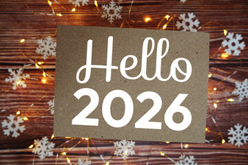 Happy New Year 2026 text on paper craft with LED and