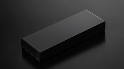 Sleek black rectangular box on dark surface