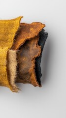 Textured fabric pieces with rich color variations.