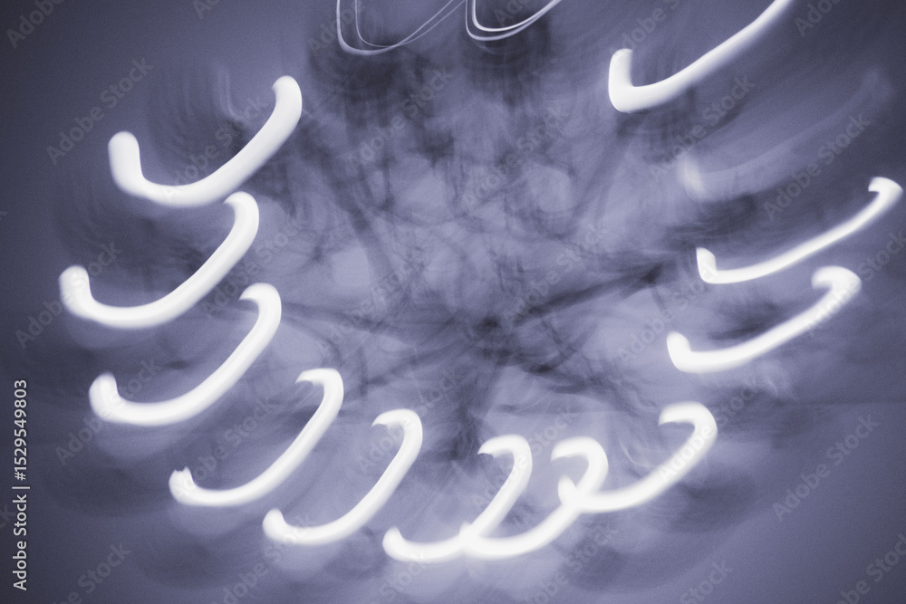 Poster dynamic light patterns creating abstract designs in a tranquil space