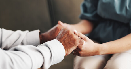 Therapy, holding hands and mature patient for consulting, comfort and support with grief at clinic....