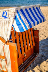 Beachside cabins lined on a sunny day showcasing vibrant colors and clear skies in a coastal location