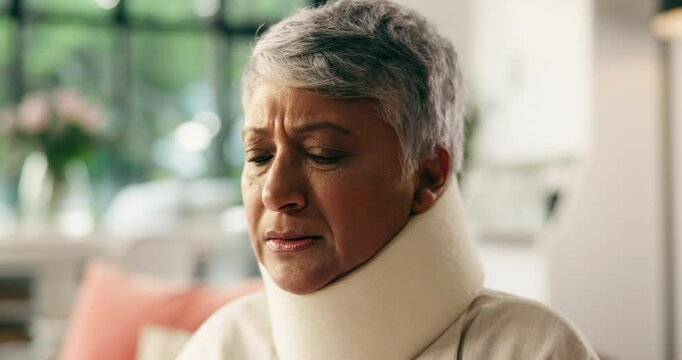 Neck brace, home and old woman with pain, discomfort and morning with recovery. Apartment, pensioner and elderly person in living room, sore ache and rehabilitation with retirement, collar and broken