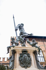 The majestic Fountain of Neptune stands in the heart of Bologna, Italy. Sculpted in the 16th...