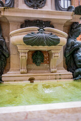 The majestic Fountain of Neptune stands in the heart of Bologna, Italy. Sculpted in the 16th...