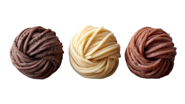 Three colorful pasta nests arranged artistically on a dark background, showcasing gourmet food styling