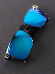 Sunglasses with tiny camera on frame.