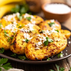 Fototapeta premium Beautifully arranged plate of food on a table featuring traditional dominican plantain dish