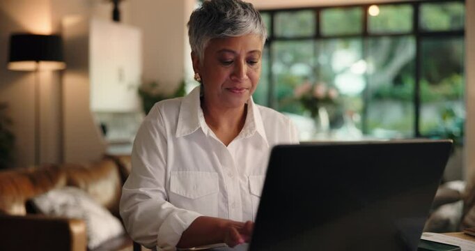 Laptop, tablet and mature woman in home office for editing draft, ebook and remote work. Computer, happy freelancer and typing email for review, writing story and author reading publication approval