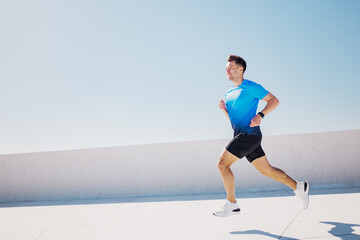 Energetic Runner Enjoying a Sunny Day on a Rooftop During Morning Exercise in an Urban Setting...