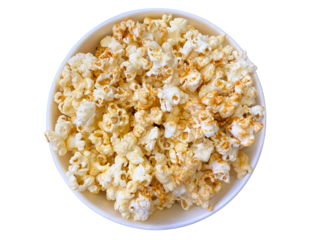 Top view of a bowl filled with delicious caramel and butter popcorn, isolated on white background. Perfect snack for movie night, party, or food advertisement.