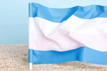 Nicaraguan Flag on Sandy Beach