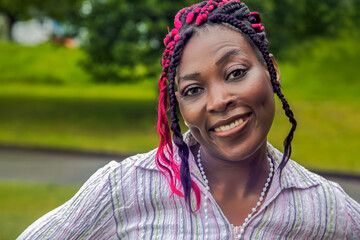 Happy African American Woman Outdoor Portrait Colorful Braids Smiling