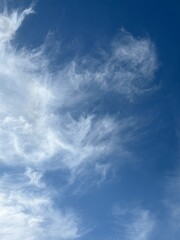 Blue sky and white cirrus clouds.