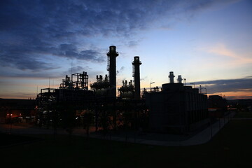Silhouette Industrial power plant or chemical oil refinery plant, industrial and investment concept