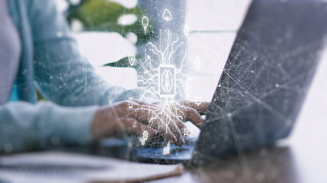 Artificial intelligence technology concept. A person using artificial intelligence technology in daily work, symbolizing the integration of AI into business and modern life.