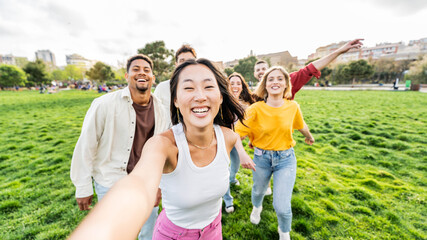 Happy friends taking selfie picture outdoors - Group of young people having fun together at the park - Youth community and people concept
