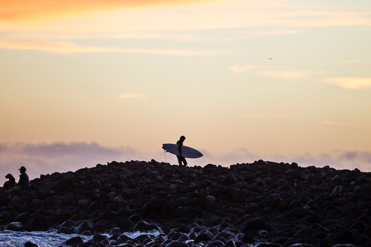 silhouette of a surfer