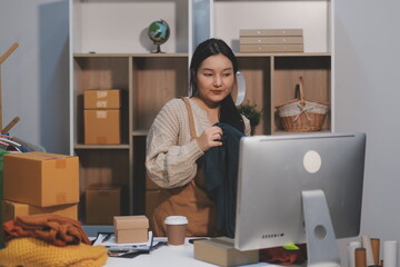 Young asian women happy after new order from customer. Surprise and shock face of asian woman success on making big sale of his online store. Online Selling. Online Shopping