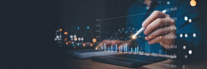 Person interacts with digital financial data graphs on a transparent screen.