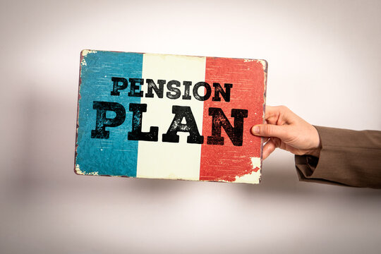 Pension Plan Concept with French Flag Sign Held by Hand on Neutral Background