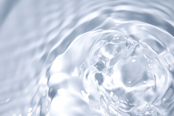 Clear Water Surface with Gentle Ripples and Bubble Reflection