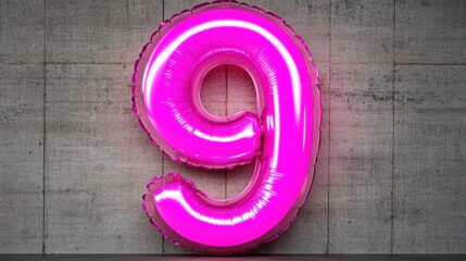 A vibrant pink balloon shaped like the number nine stands against a textured concrete wall, This eye-catching image is perfect for birthday celebrations, anniversaries, or milestones,