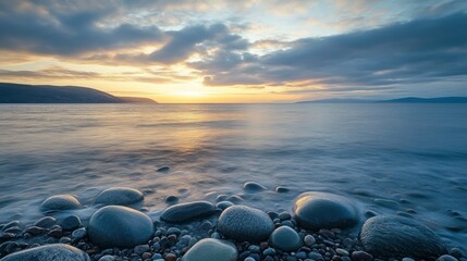 Ocean Sunset on Rock Beach Landscape
