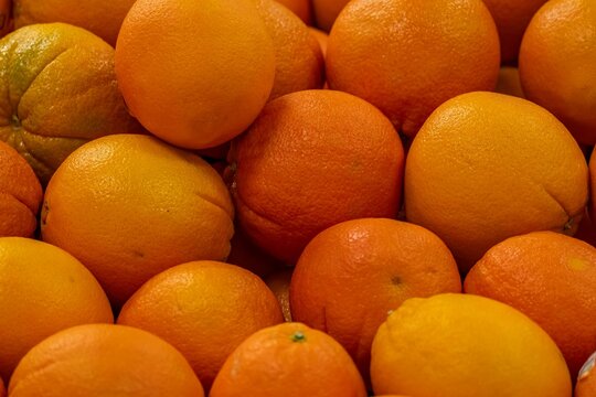 Close-Up of Fresh Oranges - Powered by Adobe