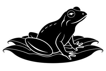 Silhouette of a frog sitting on lily pads