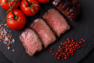 Grilled beef steak meat with salt and pepper. Beef steak grilled on a barbecue