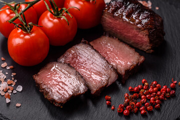 Grilled beef steak meat with salt and pepper. Beef steak grilled on a barbecue
