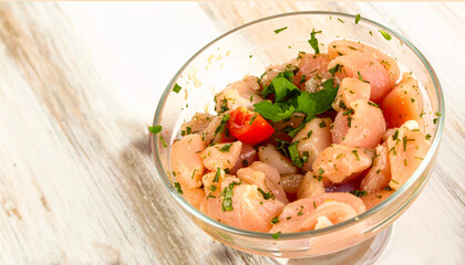Marinating Raw Chicken Pieces in Bowl