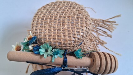 Wedding honey jar with blue bow tying the lid