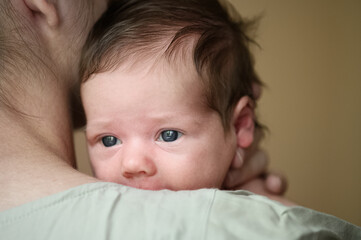 Tender Moment Between Mother and Newborn Baby