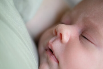 Tender Moment Between Mother and Newborn Baby