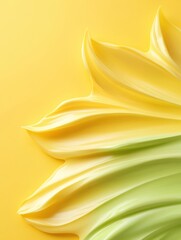Abstract sunflower-inspired design with soft yellow and green petals on a vibrant yellow background.