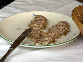 Traditional bread with spread on plate