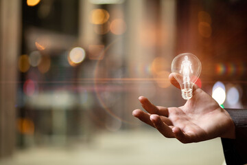 Hologram of a person glowing inside a light bulb