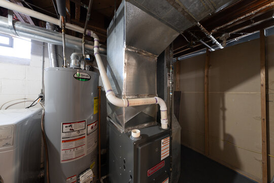 Detroit, Michigan -USA- May 9, 2025: home has been updated with a new furnace and hot water tank installed in the basement